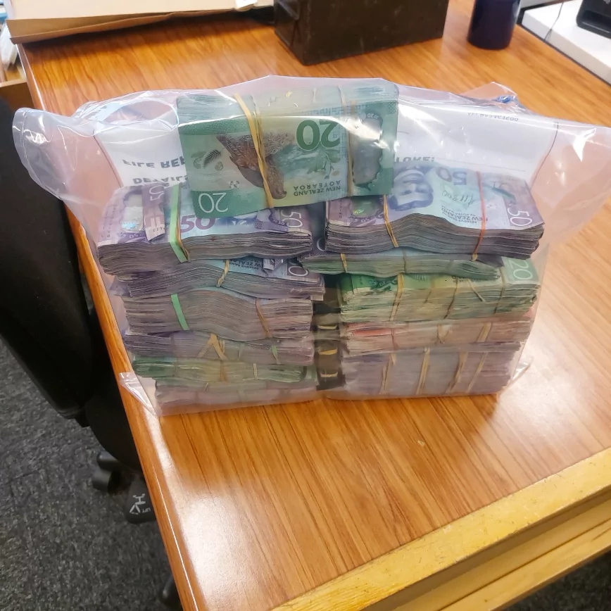 Significant police bust in Ashburton leads to arrests and seizure of firearms, drugs, and cash