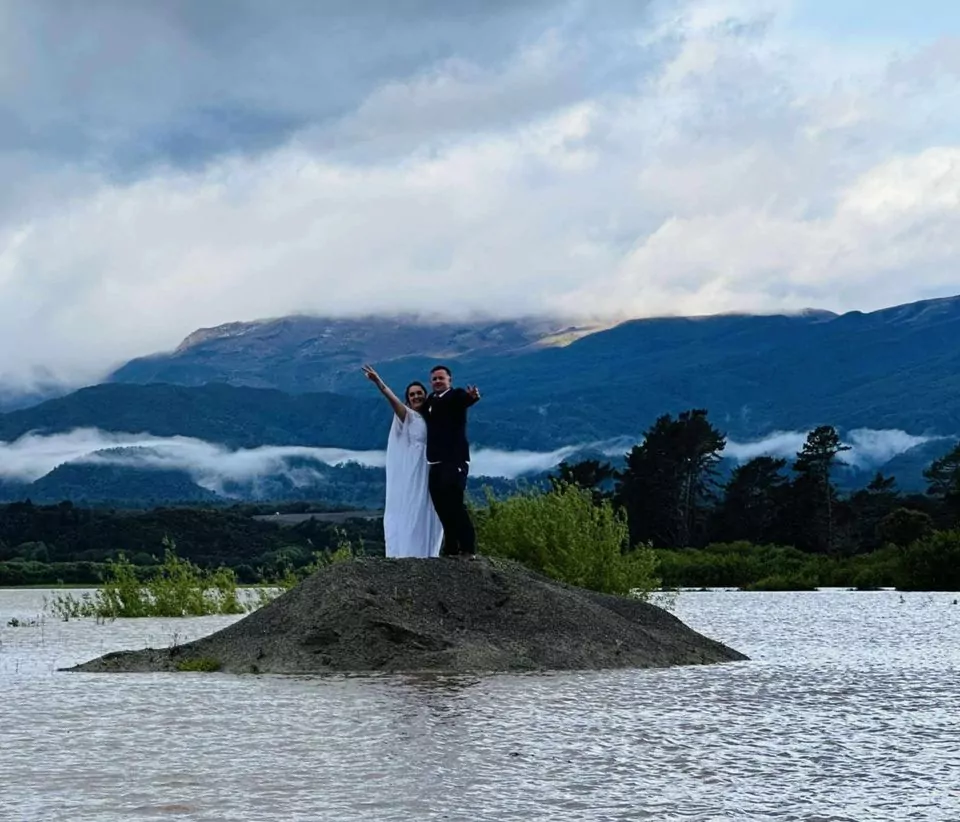 Flooded roads and fierce rain couldn’t stop this West Coast couple’s wedding celebration