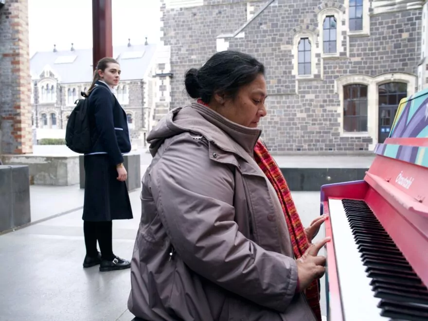 Image from Tinā | 2025. In Tinā, actors Antonia Robinson and Anapela Polataivao portray a student and a teacher at the prestigious Saint Francis School in Christchurch.